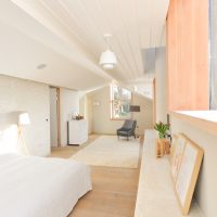 Attic bedroom with broken ceiling