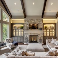 Large windows in the living room of a country house