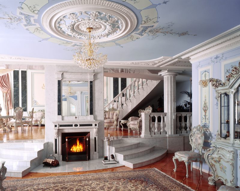 Large antique plaster rosette on the ceiling of the living room