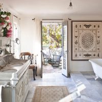 Private home bathroom with courtyard door