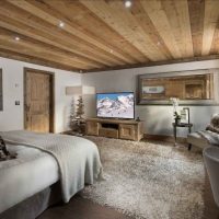 Plastered walls of a spacious bedroom