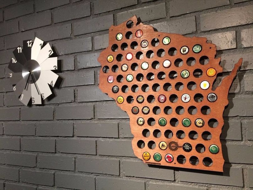 A panel on the wall with corks from beer bottles