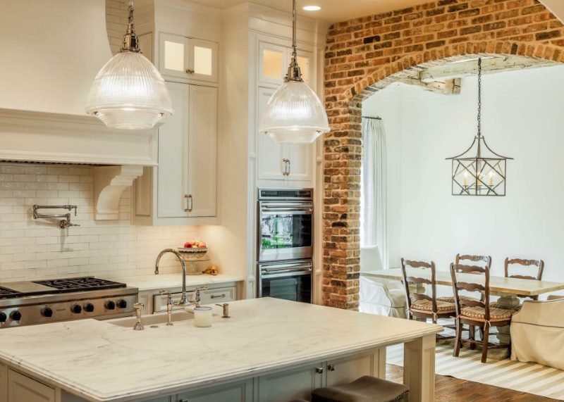 Brick arch between the kitchen and the living room