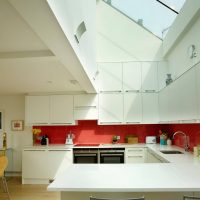 Kitchen of a country house with a window in the ceiling