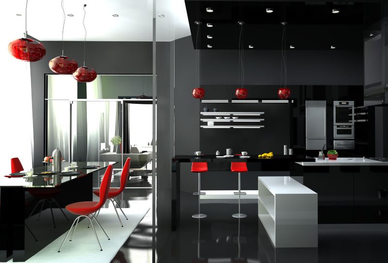 Red pendant lights in the black kitchen