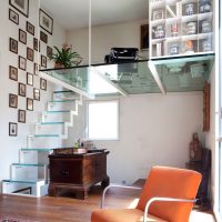 Glass floor of the second floor in a studio apartment