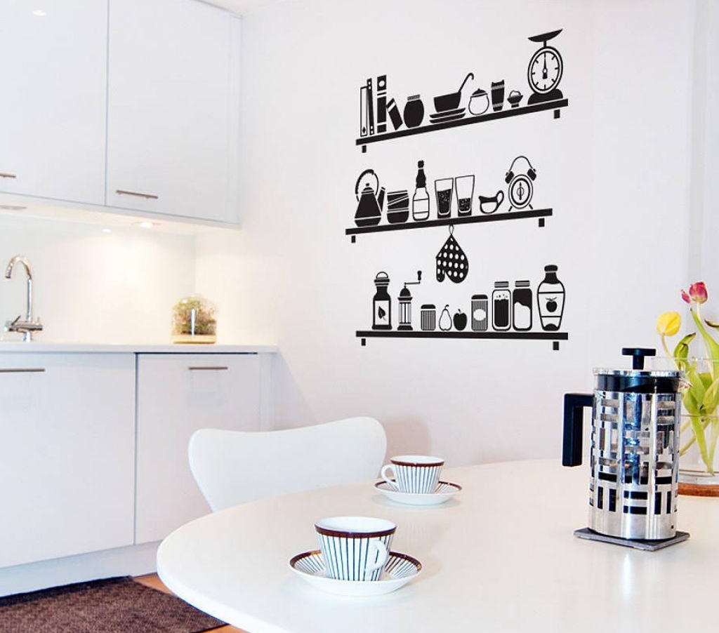 Black vinyl stickers on a white kitchen wall