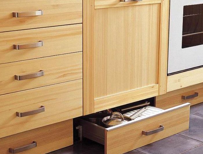 Extra drawers at the bottom of the kitchen