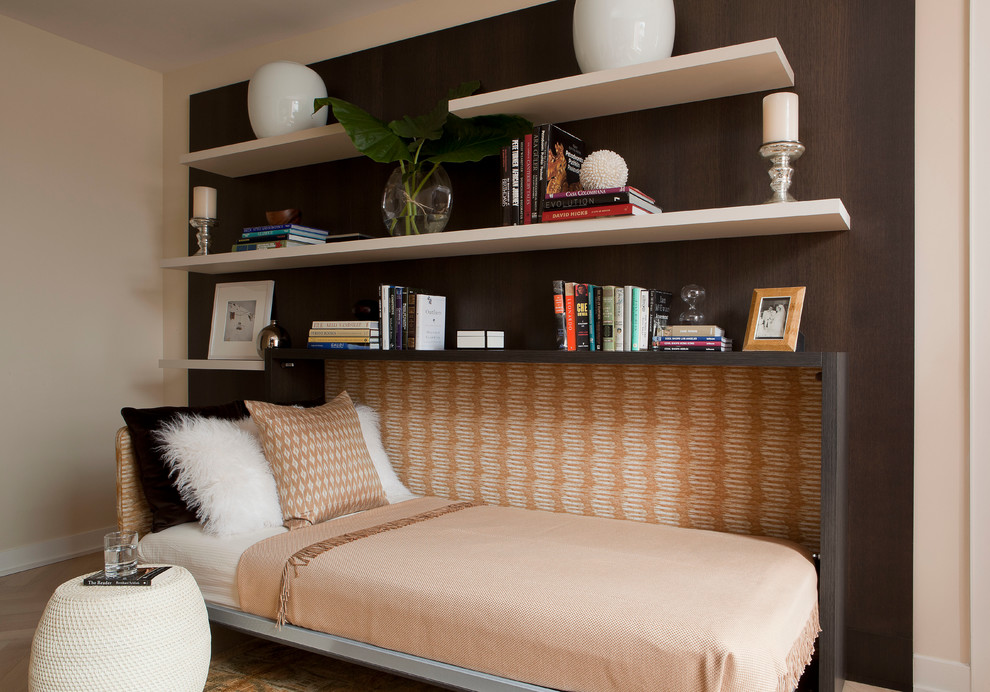 Narrow folding bed in the bedroom interior