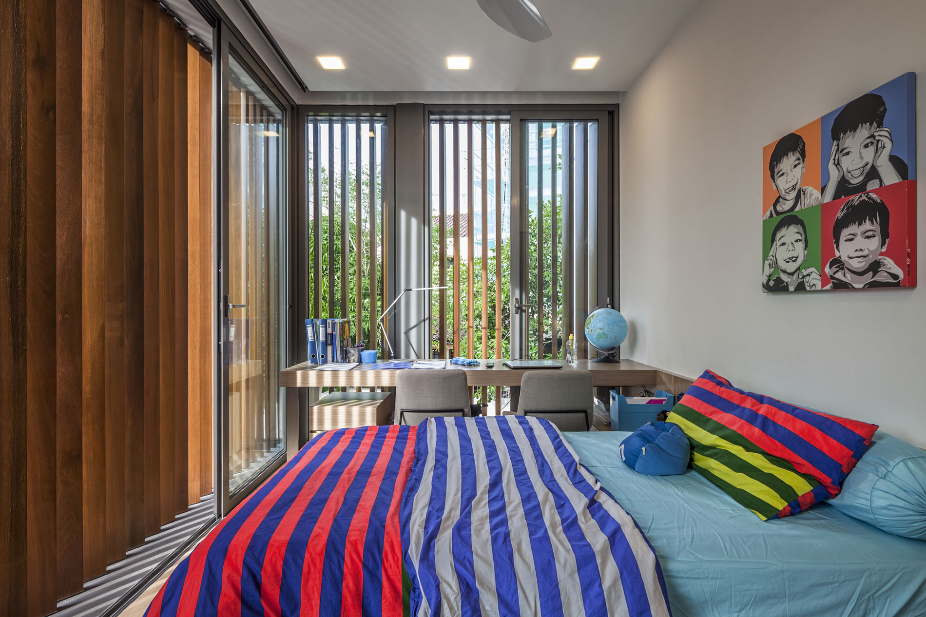 Colored striped bedspreads on a baby bed