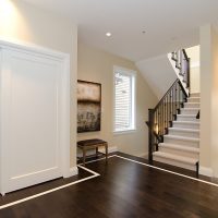 White markings on a dark brown floor