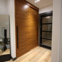 Doors of a built-in cabinet made of chipboard sheets