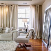 Floor mirrors in the living room interior