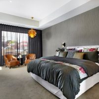 White ceiling in the bedroom with dark walls