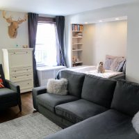 Black sofa in a bright living room