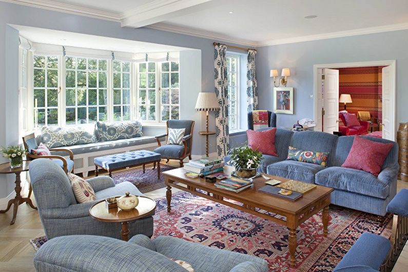 Classic living room interior with blue walls.