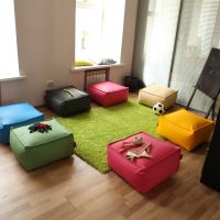 Soft padded poufs for guests