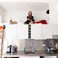 Mezzanine with a berth above the kitchen cabinets