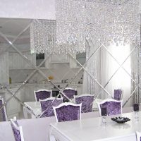 Crystal chandelier on the ceiling of the kitchen-living room