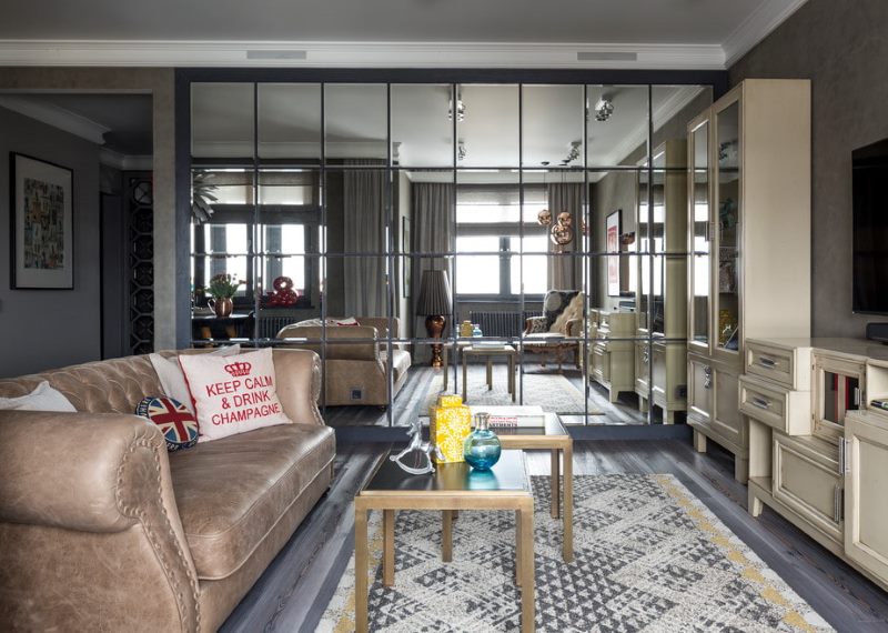 Mirror wall in the living room interior