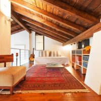 Persian carpet on the attic floor