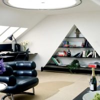 Triangular niche with bookshelves