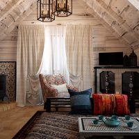 Metal fireplace in the living room interior