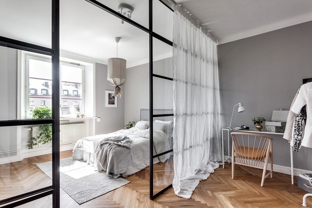 Light white curtains on a glass partition