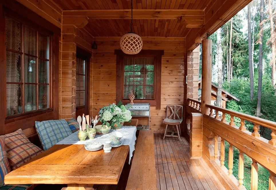 Large dining table on the balcony of a private house