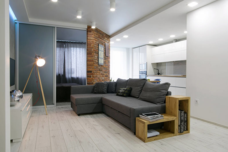 Dark gray sofa in a bright living room