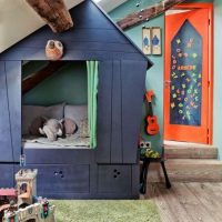 Toy house in the room of a preschool boy