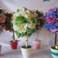 Arrangement of artificial flowers on the living room table