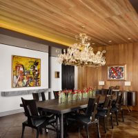 Glass chandelier over a large dining table