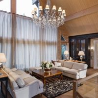 Crystal chandelier on the attic ceiling