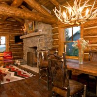 Horns chandelier over a wooden table