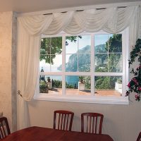 Curtains with pelmet on the kitchen window