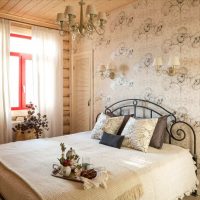 Rustic bedroom with wrought iron bed