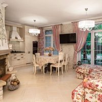 Kitchen-living room with fireplace in a country house