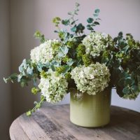 Mug with flowers on a wooden table