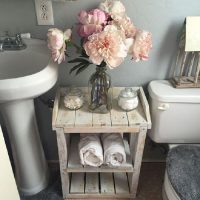 Flowers in the toilet interior of a city apartment