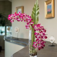 Vase of flowers on a gray countertop