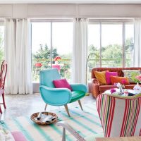 Living room interior with three windows