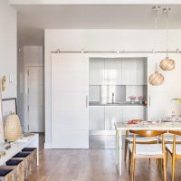 Kitchen set behind sliding doors