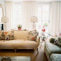 Colorful pillows on a beige sofa