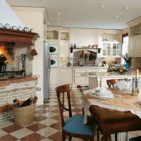 Fireplace in the interior of the kitchen-living room