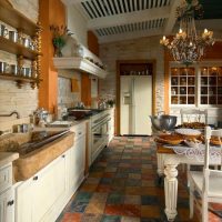 Shabby ceramic tiles on the kitchen floor