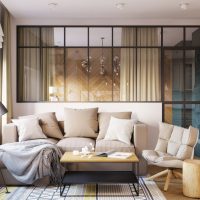 Wooden screen between living room and kitchen