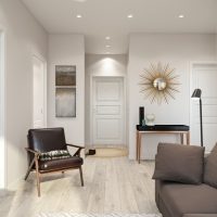 Gray sofa in the bright living room of the panel house