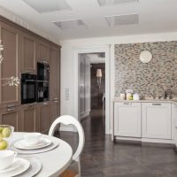 Gray porcelain tile floor in the interior of the kitchen