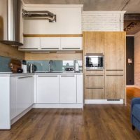 Facades of a kitchen set with wood trim